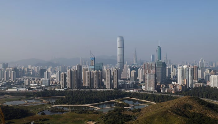 A general view of village houses at Hong Kong border facing the skyscrapers in Shenzhen, in Hong Kong, China, December 14, 2021. Picture taken December 14, 2021. — Reuters